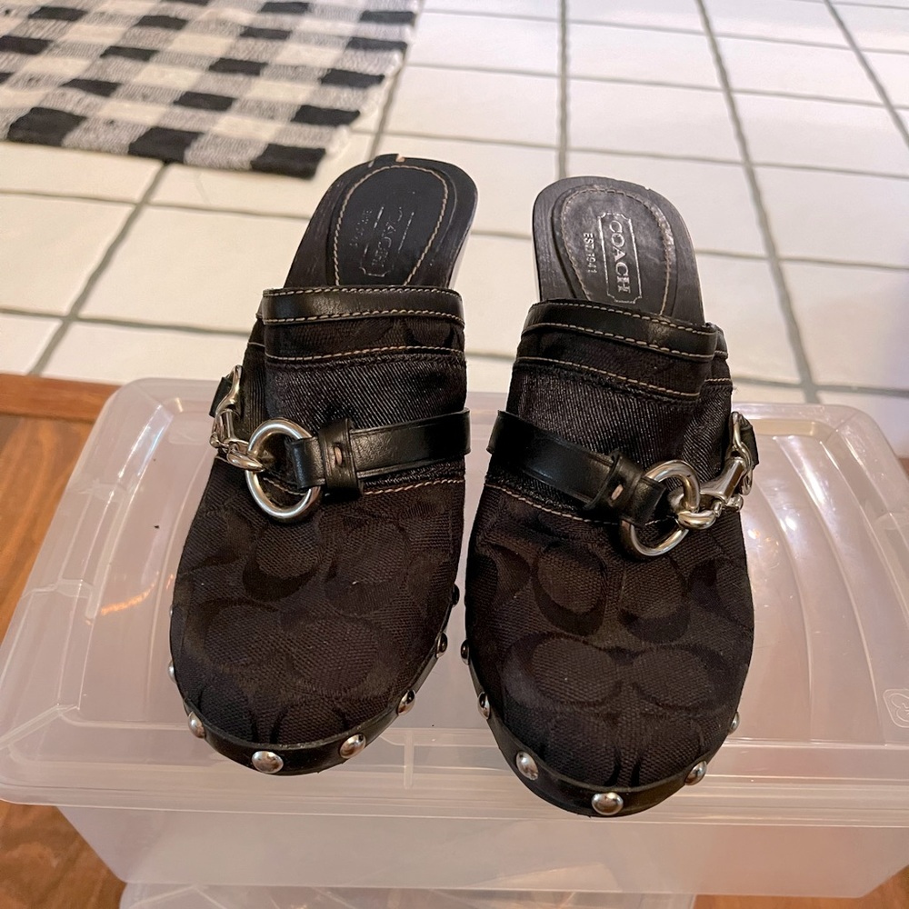 Coach mule shoe. Worn 2 times. Black very nice. 7.5 but runs a little small